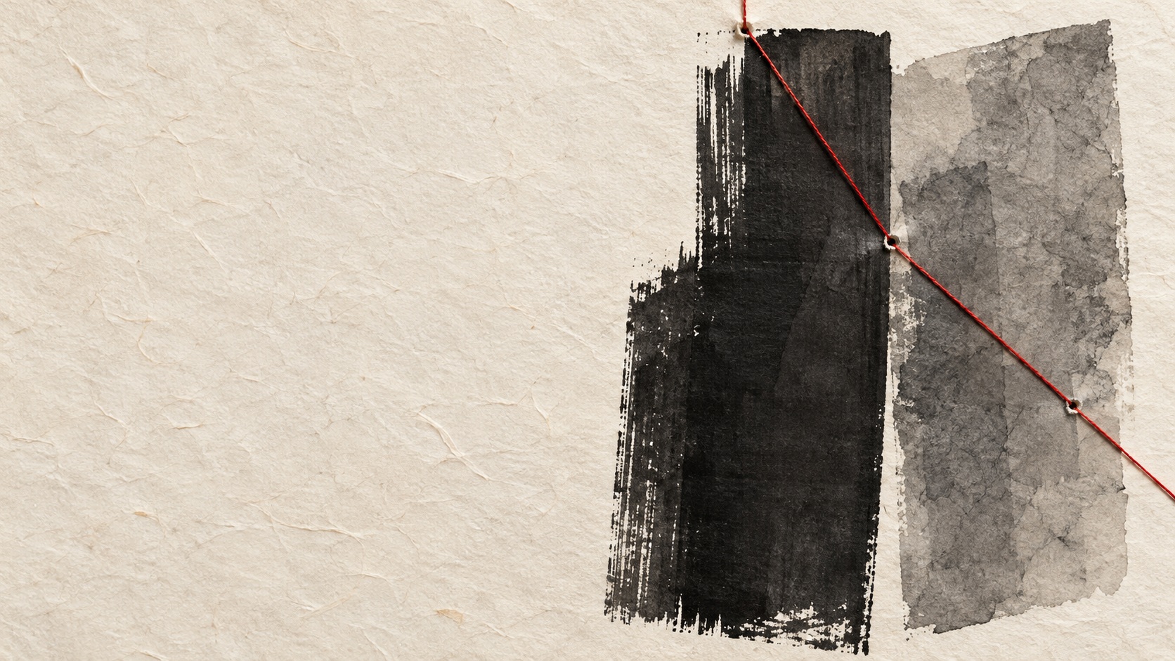 Two staggered charcoal sumi ink rectangles on ivory washi paper are crossed by a fine diagonal vermilion thread, with broad empty paper space on the left.